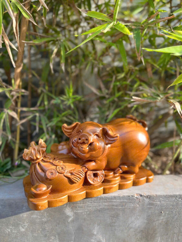 Heo tài lộc ôm bao tiền