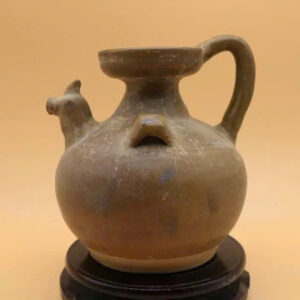 ấm vòi hình đầu gà