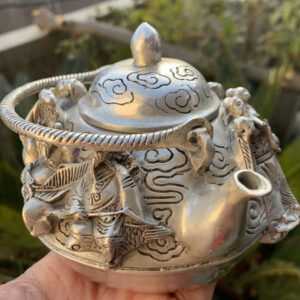 Ấm đồng bát tiên tráng bạc